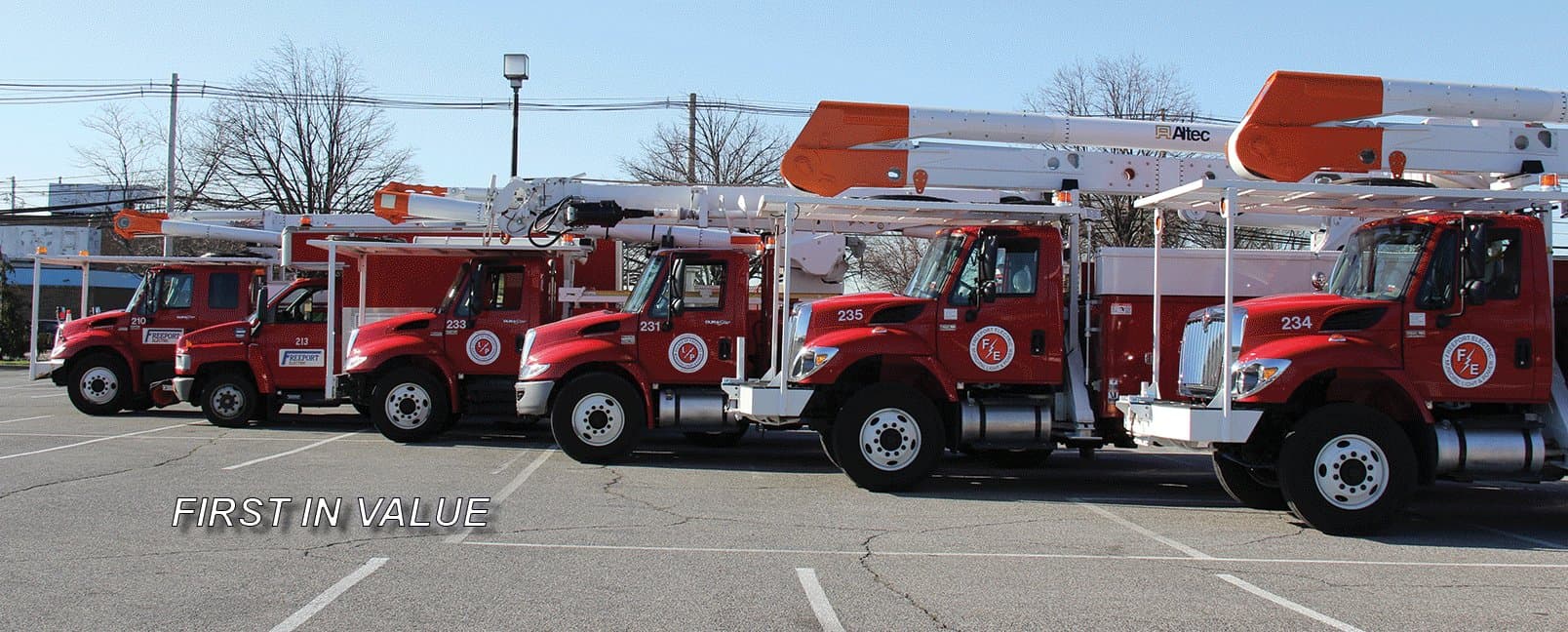 Fleet of Freeport Electric service trucks